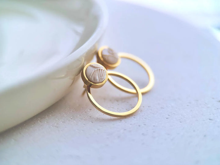 Boucle d'oreille or et ivoire