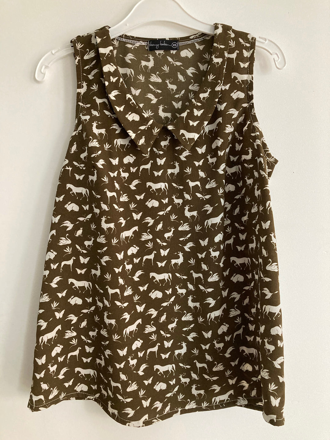 Cami April - Quadrillage fond blanc